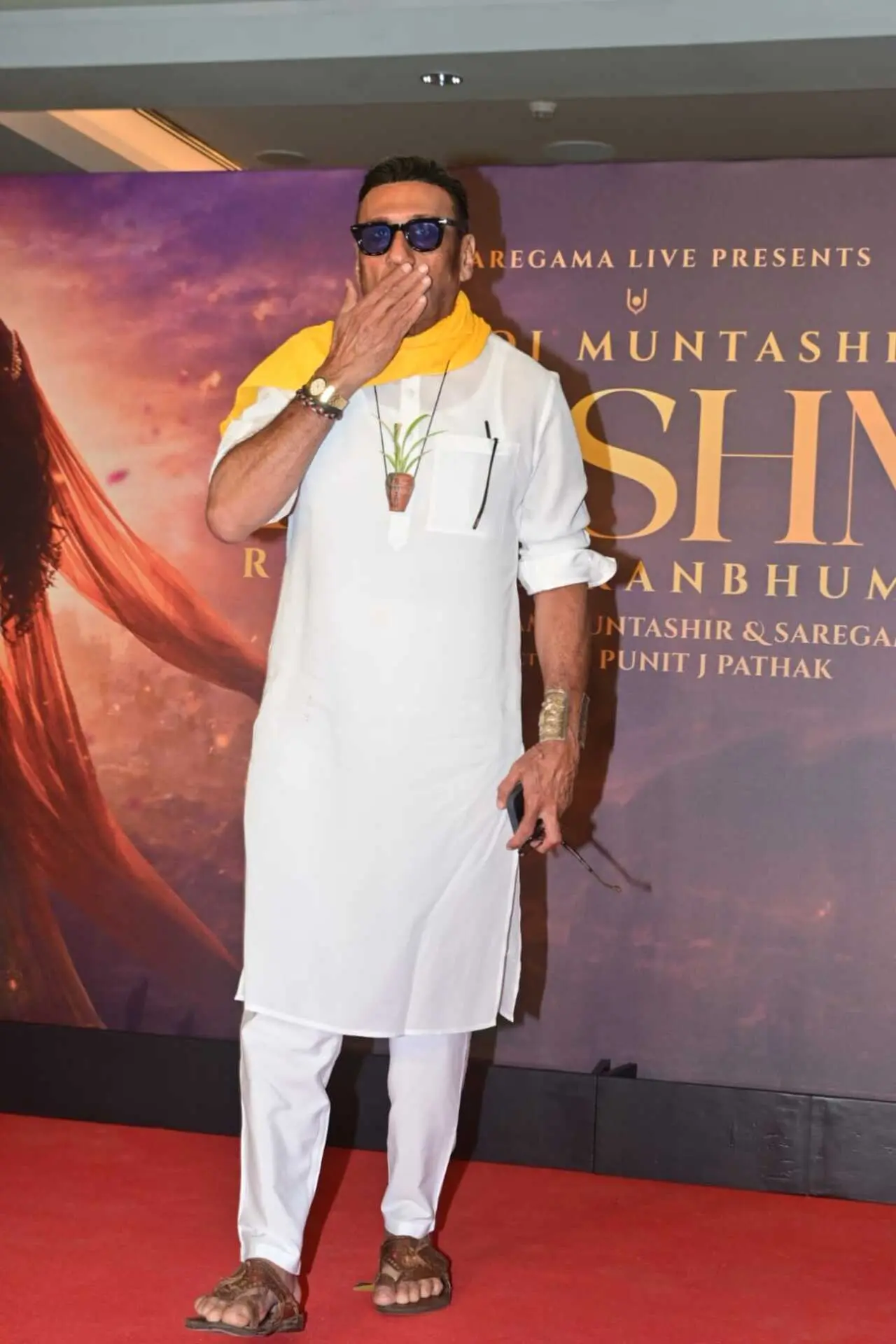 Jackie Shroff was seen in a white traditional wear with his usual plant locket around his neck at an event in the city
